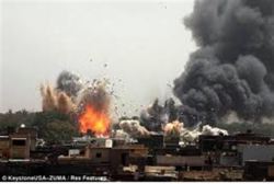 NATO bombs Qaddafi's Tripoli compound
