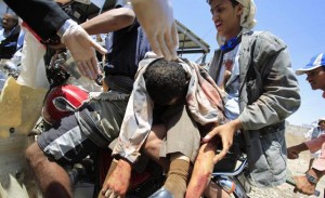 A wounded anti-government protester