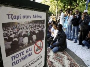 Muslims attend outdoor prayers at Attiki square