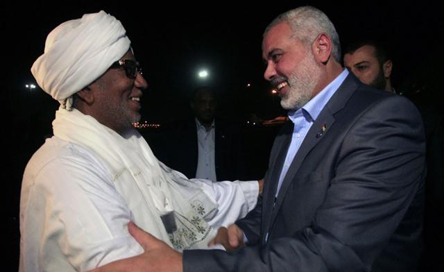 Sudan President Advisor Ibrahim Ahmed Omar (L) - Hamas terrorist leader Ismail Haniya (Reuters)