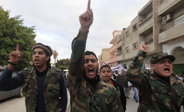 Rebels demanding the Libyan NTC apply Islamic sharia rule in the country and declare Islam the state religion, in Benghazi Jan. 20, 2012.