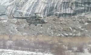 rescue teams searched for 124 soldiers and 11 civilians buried by a Himalayan avalanche near the Indian border. (Reuters)