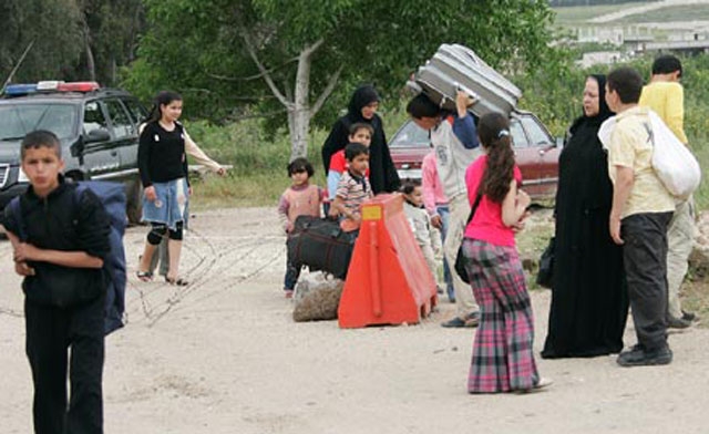 refugees who fled the neighboring flashpoint province of Homs in central Syria. AFP