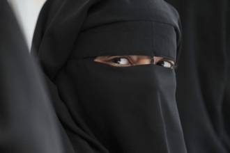 women covering their faces