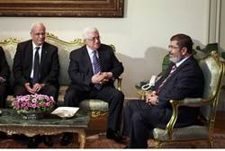 Abbas and Morsi meet