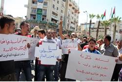 Anti-Fayyad placards at Ramallah protest