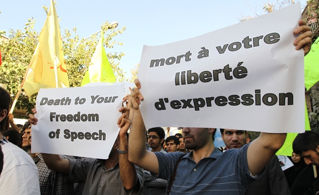 Iranians protest against the publication by a French satirical weekly of a cartoon mocking the Prophet Mohammed outside the French Embassy in Tehran. AFP