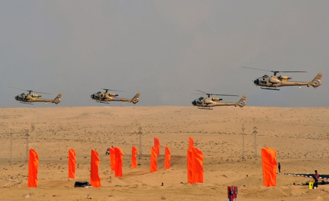 Egyptian military helicopters flying during a display of military maneuvers in the eastern Sinai. AFP