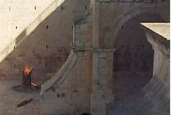 Ancient beams being burned on the Temple Mount