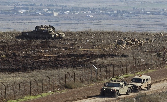 U.N.-monitored ceasefire line in response to Syrian fire. Reuters