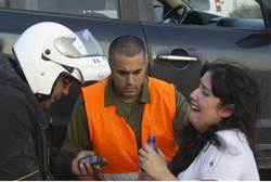 Woman reacts to rocket attack Ofakim. - Retures