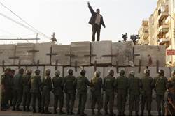 An anti-Morsi protester chants slogans - reuters