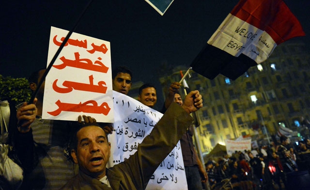 Egyptians shout slogans "Morsi is dangerous" in Cairos landmark Tahrir square on Nov. 30 2012. AFP
