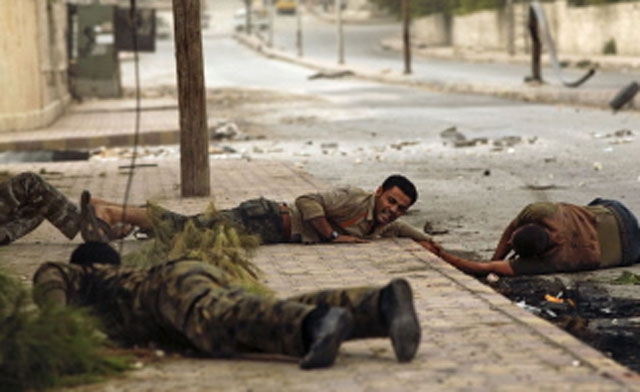 Members of the Al-Baraa bin Malek batallion - AFP