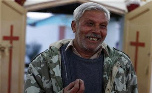 Pastor Nazir Alam smiles Reuters