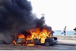burning cars in Alexandria - Reuters