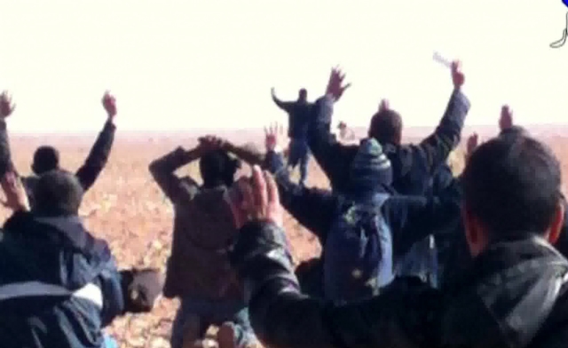 Hostages surrendering to Islamist gunmen near In Amenas in the south of the country. AFP