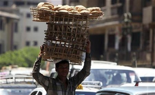 A man carries bread Reuters