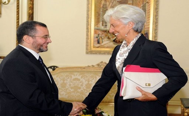 Hisham Qandil right and IMF chief Christine Lagarde. AFP