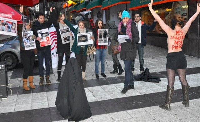 Members of the Iranian Organization Against Violence on Women in Iran dedicated their action to International Womens Day femen.org