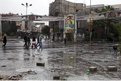 Residents of the Yarmouk camp in Damascus - AFP