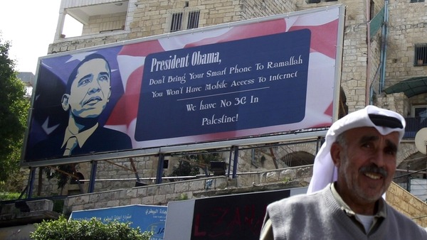 poster depicting U.S. President Barack Obama in the West Bank AFP