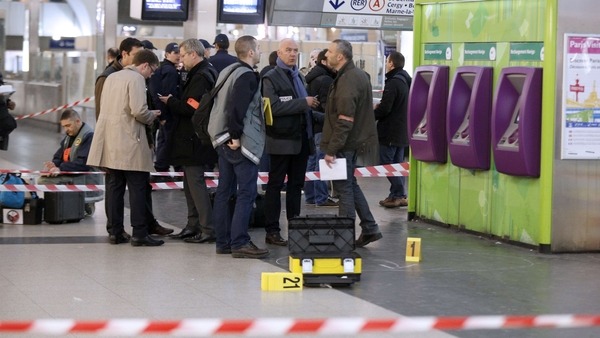 Police investigators at the site where a man attacked a French soldier AFP