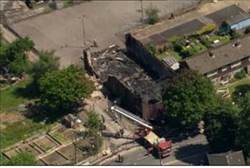 Scene of Muswell mosque fire - Reuters