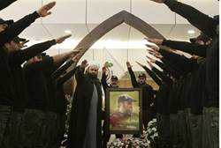 Islamist Hezbollah supporters salute at memorial for slain leader Imad Mughniye Reuters