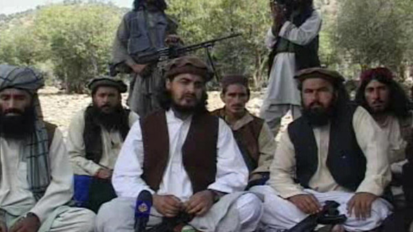 Pakistani Taliban chief Hakimullah Mehsud C sits with other militants Reuters