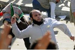 Supporters and opponents of Morsi clash in Alexandria - AFP