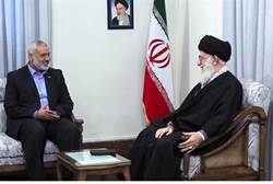 Hamas leader Ismail Haniyeh with Ayatollah Ali Khamenei illustration - Reuters