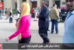 Screenshot shows victim being escorted away from baying mob