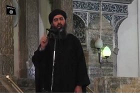 Abu Bakr al-Baghdadi makes his first appearance in Mosuls Great Mosque - Reuters