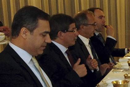 Hakan Fidan L Ahmet Davutoglu -Reuters