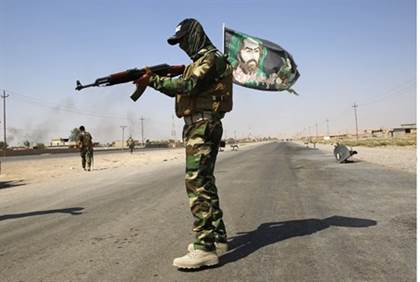 Shia Islamist fighter from the Iraqi Badr Brigade militia - Reuters