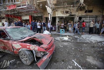 Aftermath of a Baghdad bombing - Reuters